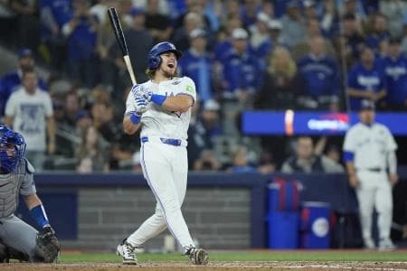 Toronto Blue Jays third baseman Addison Barger (47) reacts after a foul tip in the ninth inning against the Los Angeles Dodgers during game seven of the 2025 MLB World Series at Rogers Centre.