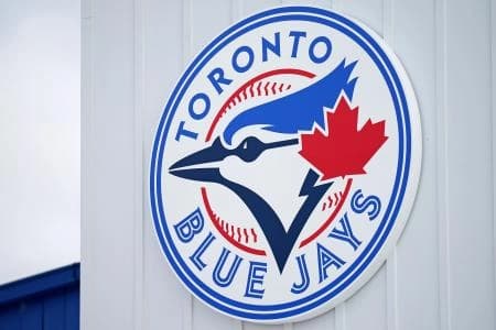 A detailed view of the Toronto Blue Jays logo on a building at TD Ballpark during the spring training game between the Toronto Blue Jays and the Philadelphia Phillies.