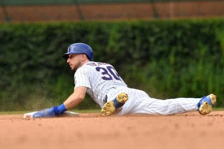 Chicago Cubs right fielder Kyle Tucker (30) steals second base during the eighth inning against the Pittsburgh Pirates at Wrigley Field.