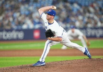 Toronto Blue Jays relief pitcher Trent Thornton (57) throws a pitch against the San Francisco Giants during the eighth inning at Rogers Centre.