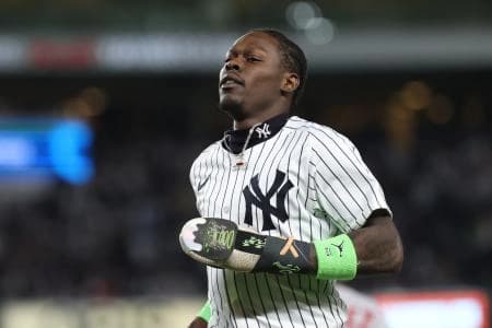 New York Yankees second baseman Jazz Chisholm Jr. (13) runs of the field between innings during game three of the Wildcard round for the 2025 MLB playoffs against the Boston Red Sox at Yankee Stadium.