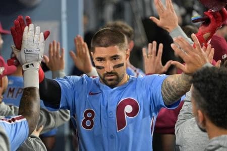 Philadelphia Phillies right fielder Nick Castellanos (8) celebrates after scoring a run during the eighth inning against the Los Angeles Dodgers during game three of the NLDS round for the 2025 MLB playoffs at Dodger Stadium.
