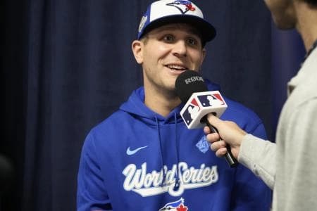 Toronto Blue Jays center fielder Daulton Varsho (5) answers questions at the World Series media day interviews at Rogers Centre.