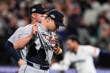 Detroit Tigers pitcher Tommy Kahnle (43) and first baseman Spencer Torkelson (20) walk off the field after 3-2 loss to Seattle Mariners in 15 innings at ALDS Game 5 at T-Mobile Park in Seattle on Friday, Oct. 10, 2025.