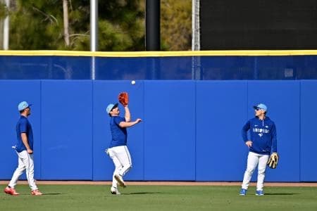 Toronto Blue Jays outfielder Davis Schneider (36) catches a fly ball during spring training at Bobby Mattick Training Center at Englebert Complex