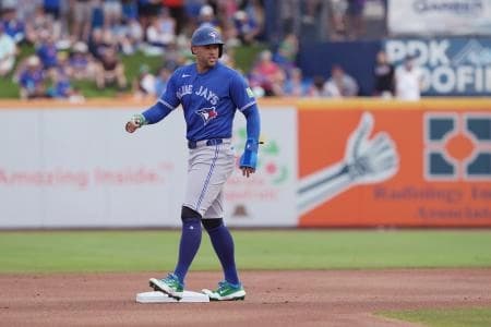 Toronto Blue Jays designated hitter George Springer (4) advances to second base on a balk in the first inning against the New York Mets at Clover Park