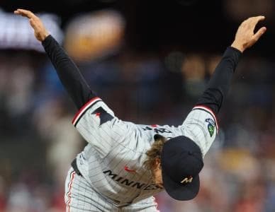 Minnesota Twins pitcher Joe Ryan (41) stretches before throwing a pitch during the second inning against the Philadelphia Phillies at Citizens Bank Park.