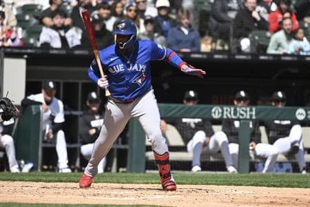 Toronto Blue Jays first baseman Vladimir Guerrero Jr. (27) reacts after he was walked to load the bases during the third inning against the Chicago White Sox at Rate Field