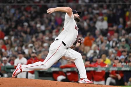 Boston Red Sox starting pitcher Lucas Giolito (54) pitches against the Athletics during the third inning at Fenway Park.