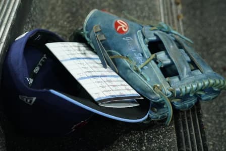 The glove, player information card and hat of Toronto Blue Jays right fielder George Springer (not pictured) in the dugout of a game against the Los Angeles Dodgers at Rogers Centre.