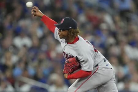 Boston Red Sox starting pitcher Brayan Bello (66) pitches to the Toronto Blue Jays during the third inning at Rogers Centre.