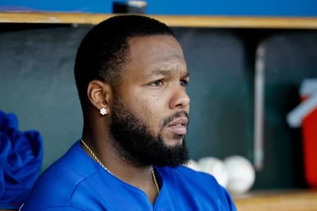 Toronto Blue Jays first baseman Vladimir Guerrero Jr. (27) sits in dugout in the seventh inning against the Detroit Tigers at Comerica Park.
