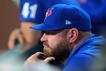 Toronto Blue Jays manager John Schneider (14) looks on against the Arizona Diamondbacks during the seventh inning at Chase Field.