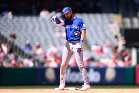 Toronto Blue Jays left fielder Nathan Lukes (38) gestures after hitting an RBI double during the seventh inning against the Los Angeles Angels at Angel Stadium.