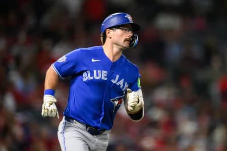 Toronto Blue Jays left fielder Davis Schneider (36) runs during the fifth inning against the Los Angeles Angels at Angel Stadium.