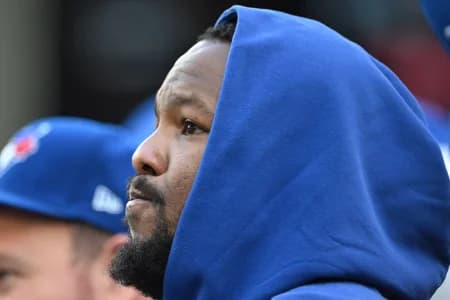 Toronto Blue Jays first baseman Vladimir Guerrero Jr. (27) looks on from the bench during play against the Miami Marlins at Rogers Centre.