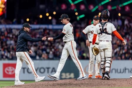 San Francisco Giants pitcher Ryan Borucki (47) is relieved by San Francisco Giants manager Tony Vitello during the seventh inning against the Philadelphia Phillies at Oracle Park.