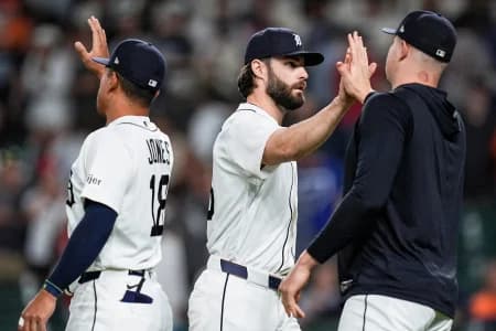 Detroit Tigers pitcher Brenan Hanifee (75), center high-fives pitcher Tarik Skubal (29) to celebrate 4-0 win over Los Angeles Angels at Comerica Park in Detroit on Wednesday, May 27, 2026.