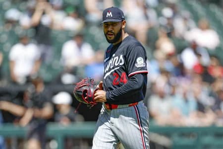 Minnesota Twins starting pitcher Simeon Woods Richardson (24) leaves a baseball game against the Chicago White Sox during the third inning at Rate Field.