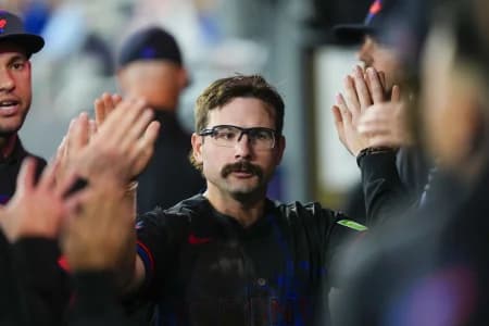 Toronto Blue Jays left fielder Davis Schneider (36) celebrates scoring against the Cleveland Guardians during the first inning at Rogers Centre.