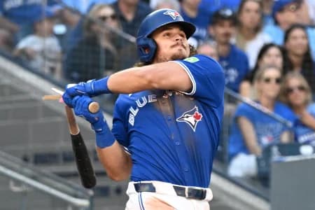Toronto Blue Jays third baseman Addison Barger (47) breaks his bat as he hits a double against the Tampa Bay Rays in the fifth inning at Rogers Centre.