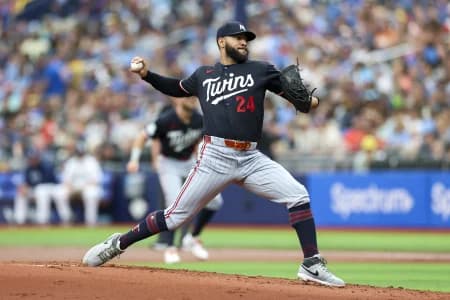 Minnesota Twins starting pitcher Simeon Woods Richardson (24) throws a pitch against the Tampa Bay Rays in the first inning at Tropicana Field.