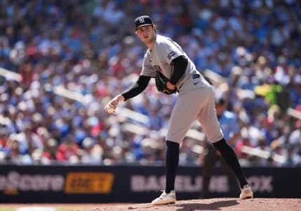 New York Yankees starting pitcher Cam Schlittler (31) looks over at first base against the Toronto Blue Jays during the second inning at Rogers Centre.