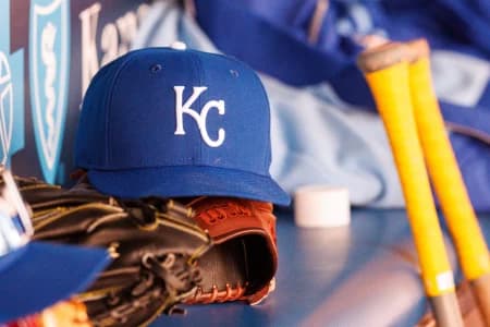 Kansas City Royals hat sits in the dugout during the sixth inning against the Milwaukee Brewers at Kauffman Stadium.