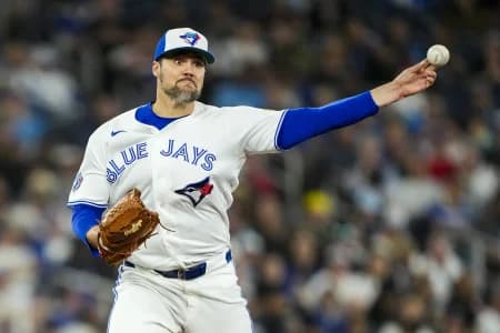 Toronto Blue Jays Brendon Little (54) throws to first base during the sixth inning against the Colorado Rockies at Rogers Centre.