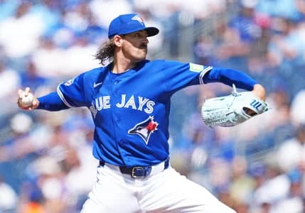 Toronto Blue Jays starting pitcher Kevin Gausman (34) throws a pitch against the New York Yankees during the first inning at Rogers Centre.