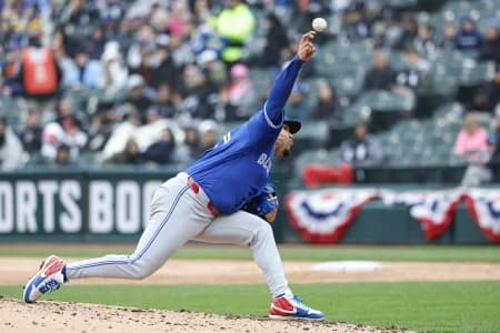 Toronto Blue Jays relief pitcher Lazaro Estrada (60) delivers a pitch against the Chicago White Sox during the fourth inning at Rate Field.