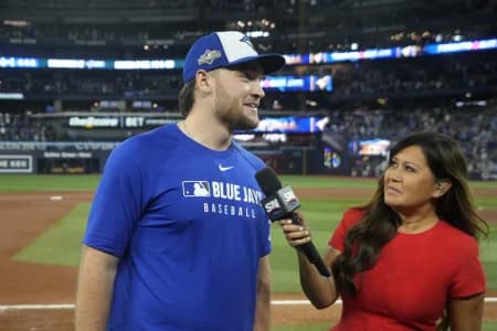 Toronto Blue Jays pitcher Trey Yesavage (39) is interviewed by Sportsnet broadcaster Hazel Mae after defeating the Seattle Mariners during game six of the ALCS round for the 2025 MLB playoffs at Rogers Centre.