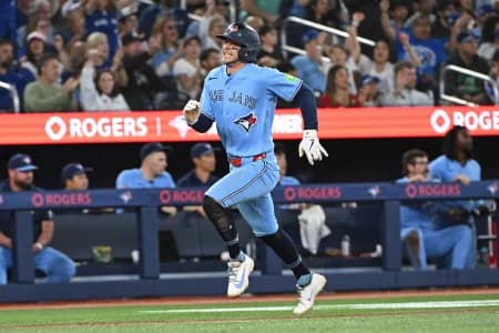 Toronto Blue Jays short stop Ernie Clement (22) scores in the fourth inning against the New York Yankees at Rogers Centre.