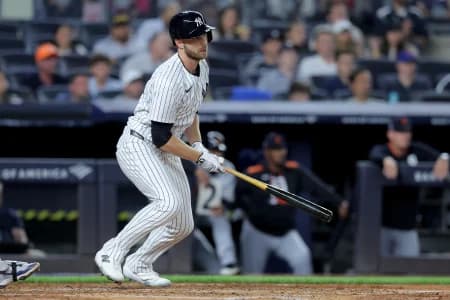 New York Yankees left fielder Austin Slater (29) watches his RBI single against the Detroit Tigers during the fourth inning at Yankee Stadium.