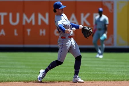 Toronto Blue Jays second baseman Ernie Clement (22) throws to first for an out during the first inning against the Baltimore Orioles at Oriole Park at Camden Yards.