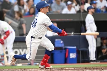 Toronto Blue Jays second baseman Luis Urias (48) hits a double against the New York Mets in the fifth inning at Rogers Centre.
