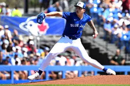 Toronto Blue Jays starting pitcher Ricky Tiedemann (70) throws a pitch in the first inning of a spring training game against the Detroit Tigers at TD Ballpark.
