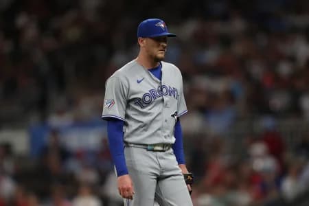 Toronto Blue Jays pitcher Jeff Hoffman (23) walks to the dugout against the Atlanta Braves in the seventh inning at Truist Park.