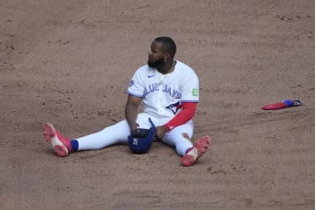 Toronto Blue Jays first baseman Vladimir Guerrero Jr. (27) sits on the infield after caught trying to steal second base by Tampa Bay Rays second baseman Richard Palacios (not pictured) during the seventh inning at Rogers Centre.