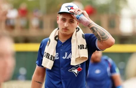 Toronto Blue Jays pitcher Ricky Tiedemann (70) walks to the dugout before the game against the Pittsburgh Pirates at LECOM Park.