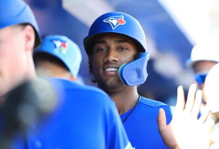 Toronto Blue Jays shortstop Arjun Nimmala (18) scores a run during the second inning against Team Canada at TD Ballpark.