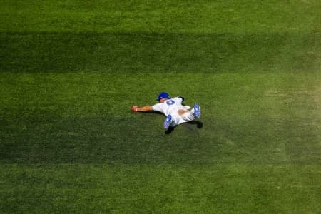 Toronto Blue Jays shortstop Andrés Giménez (0) fails to field a ball during the sixth inning against the Boston Red Sox at Rogers Centre.