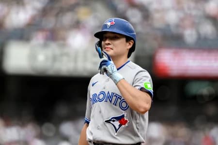 Toronto Blue Jays center fielder Brett Bateman (21) reacts after hitting a single against the New York Yankees during the third inning at Yankee Stadium