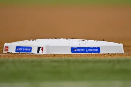 A view of the Father's Day logo on first base during the game between the Texas Rangers and the San Diego Padres at Globe Life Field.