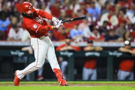 Cincinnati Reds third baseman Eugenio Suarez (28) hits a double in the eighth inning against the St. Louis Cardinals at Great American Ball Park.