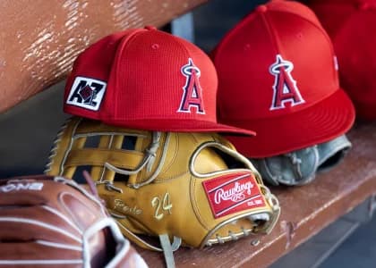 Detailed view of the Los Angeles Angels logo on a hat in the dugout during a spring training game at Camelback Ranch-Glendal