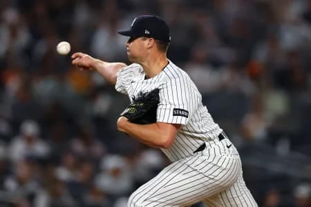 New York Yankees pitcher Justin Topa (56) pitches against the Houston Astros in the eighth inning at Yankee Stadium.