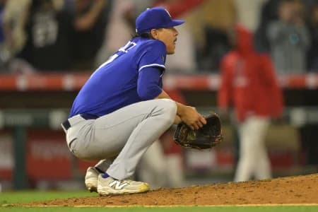 Los Angeles Dodgers relief pitcher Jose Rodriguez (97) reacts after giving up a walk-off single to Los Angeles Angels left fielder Taylor Ward (3) in the ninth inning at Angel Stadium