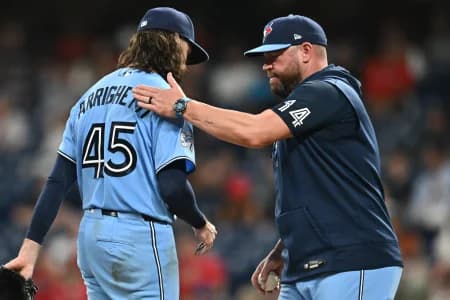 Toronto Blue Jays manager John Schneider (14) relives pitcher Spencer Arrighetti (45) during the sixth inning against the Cleveland Guardians at Progressive Field