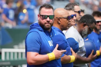 Toronto Blue Jays manager John Schneider (14) on field against the Kansas City Royals during the first inning at Kauffman Stadium.